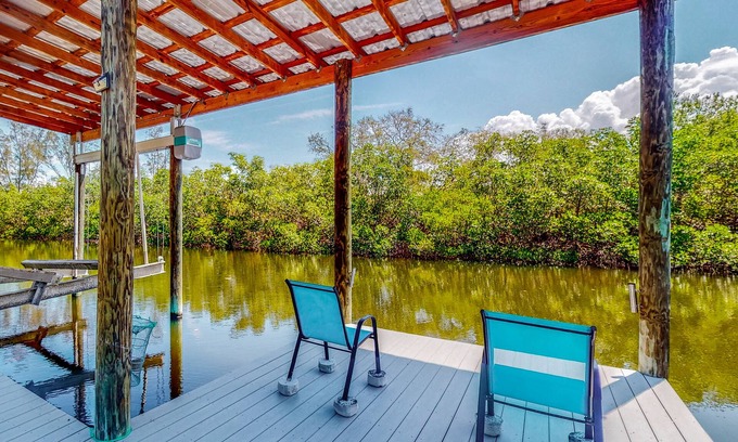 Ruskin Casa | Fishing getaway with a pool, hot tub, game room, dock, and grill - dog-friendly