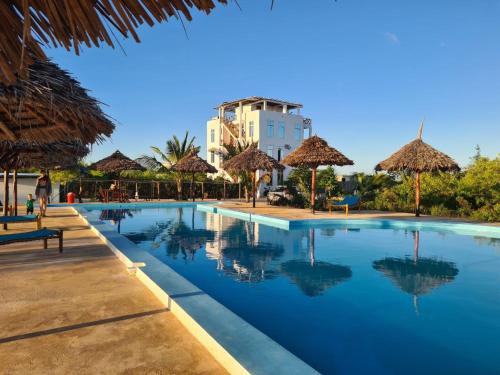 Mnemba Apartamento | Five Seasons Zanzibar opposite Mnemba island Hotel