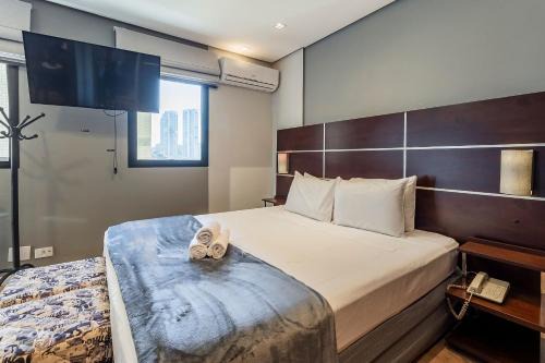 Chacara Santo Antonio Apartamento | Flat king size, consulado, garagem + A/C | em 6x