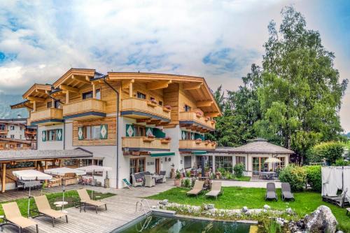 Ellmau Cama Y Desayuno | Flora - Das kleine Gartenhotel