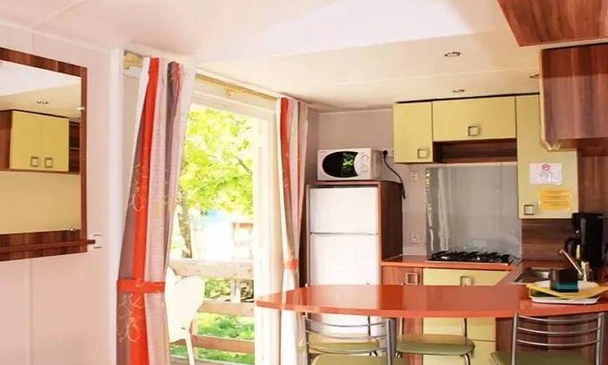 Michard West Casa | Flower Camping Mas de Champel **** - Mobile-Home 30m2 - Standard - 2 bedrooms - semi-covered terrace - TV - Clim 4 people