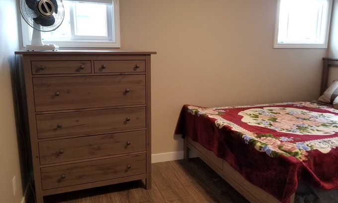 Northwest Calgary Casa | For female only Bedroom with queen bed