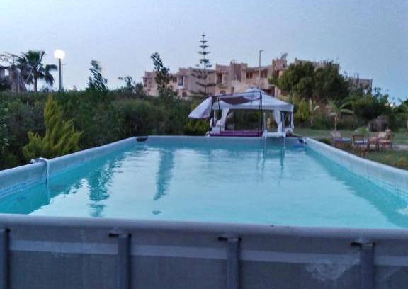 Marina El Alamein Chalet De Esquí | Four Bedroom Chalet at Marina 4 Private Pool and Garden