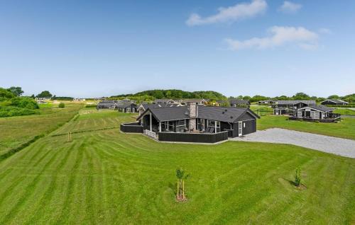 Spodsbjerg Casa | Four-Bedroom Holiday Home In Rudkobing