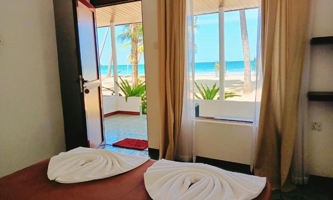 Trincomalee Hotel | French garden Pragash Beach Hotel
