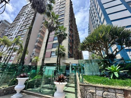 Aparecida Apartamento | Frente Mar com garagem, Ar Condicionado e WI-FI grátis em Santos