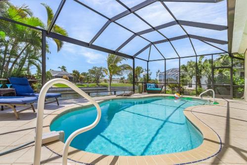 Trafalgar Casa | Freshwater Canal, Bicycles, Heated Pool - Casamigos - Roelens Vacations