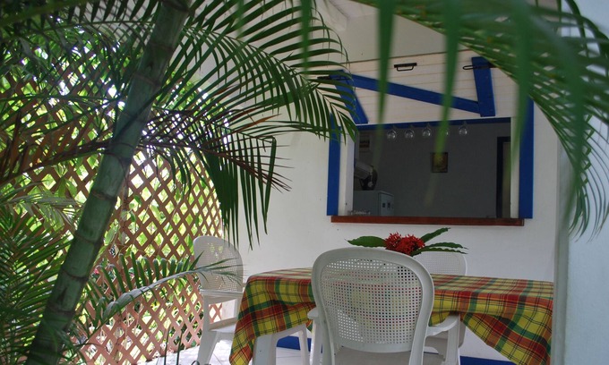 Douville Cabaña | Cabaña amistoso en el jardín tropical