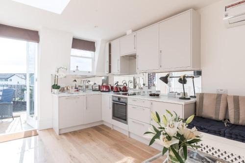 Parsons Green and Walham Apartamento | Fulham Broadway 1 Bed - Sw Balcony - Pet Friendly