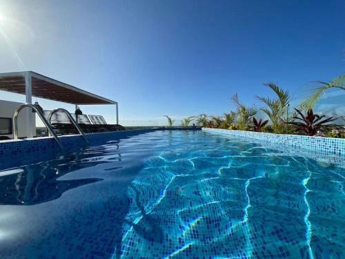 Ejidal Apartamento | Fully equipped 1BD PH with Gym Rooftop Pool and BBQ