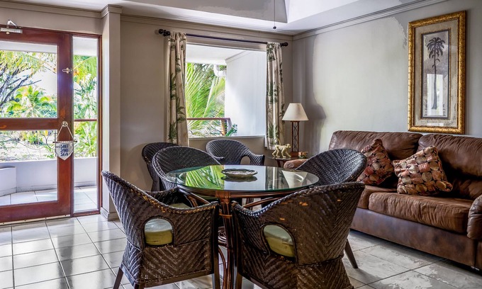 Damas Condominio | Fun & bright getaway with furnished balcony, pool, volleyball & tennis courts