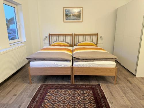 Moosinning Apartamento | Gästehaus DAS BLEICHBACH Ferienwohnungen & Apartments