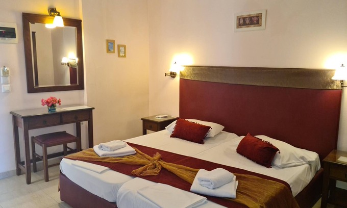 Benitses Apartamento | Apartamento Galini Sea 4 en la playa con Wi-Fi, aire acondicionado y jardín