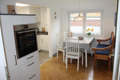 Dornumergrode Apartamento | Gemütliche Ferienwohnung an der Nordseeküste mit Familie und Hund