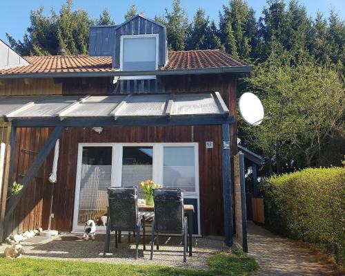 Zandt Casa | Gemütliches Ferienhaus mit Kamin und eigenem Garten in bayerischem Feriendorf
