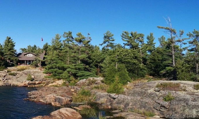 The Archipelago Cabaña | Georgian Bay Private island, unique authentic log cabin