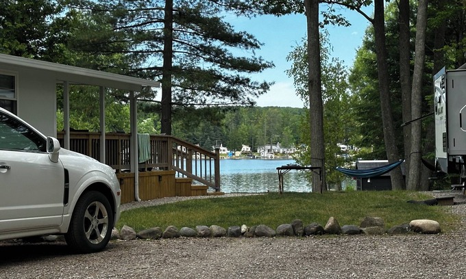 Harrison Casa | Glamp & Get Amped Lake views, bubbly hot tub, paddle boat joy, & unlimited fun!