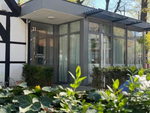 Mettingen Apartamento | Glashaus mit 3 Gästezimmer