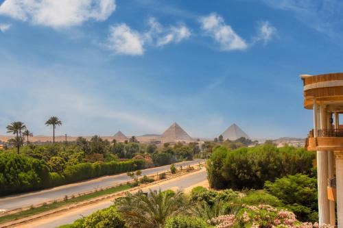 Giza Hotel | Golden palm sunrise inn