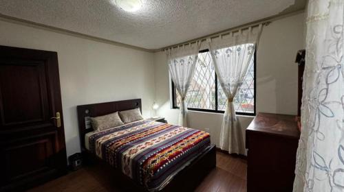 Miguel Egas Cabezas Apartamento | Golden Wasi Family