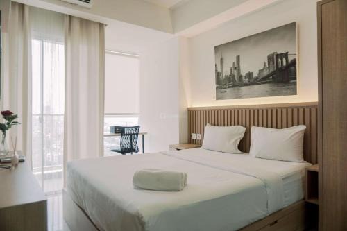 Pinang Apartamento | Good and Homey Studio at Pacific Garden Alam Sutera Apartment By Travelio