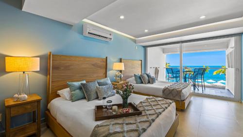 Las Glorias Apartamento | Gorgeous 1BR Condo with Pools & Sea Views