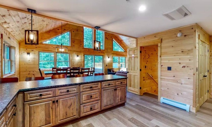 Carrabassett Valley Cabina | Gorgeous dog-friendly cabin with great view, deck, hot tub, & gas fireplace