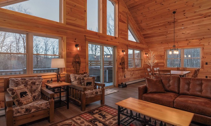 Carrabassett Valley Cabina | Gorgeous dog-friendly cabin with great view, deck, hot tub, & gas fireplace