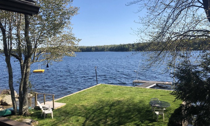 Dedham Casa | Gorgeous Lakefront House Rental facing South on Green Lake in Dedham, Maine