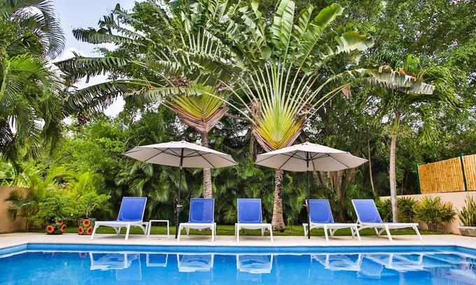 Puerto Aventuras Casa | Remodelado oasis de 4 dormitorios con piscina y carrito de golf, a minutos de la playa