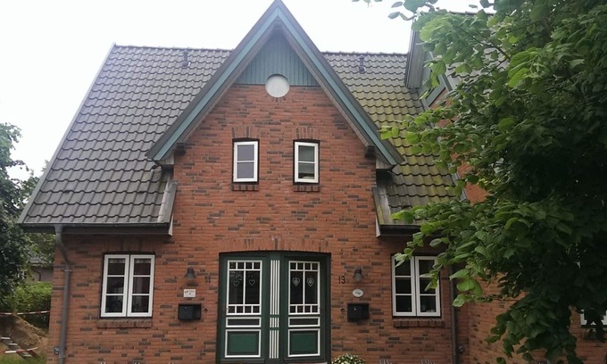 Wyk auf Foehr Apartamento | Green Eilun 13 - Modernes Reihenhaus mit Garten, Spielecke, Waldzugang und Nähe zum Südstrand