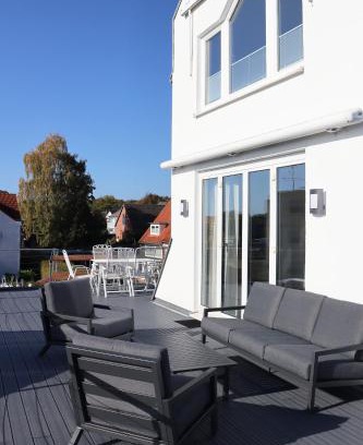 Sierksdorf Apartamento | Große Penthouse Ferienwohnung mit Meerblick, Sonnenterrasse & Luxusbad von "Momentic"
