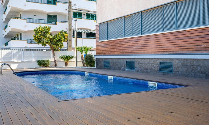 Torredembarra Apartamento | Planta baja en Torredembarra con piscina, aire acondicionado, WIFI y cerca de la playa