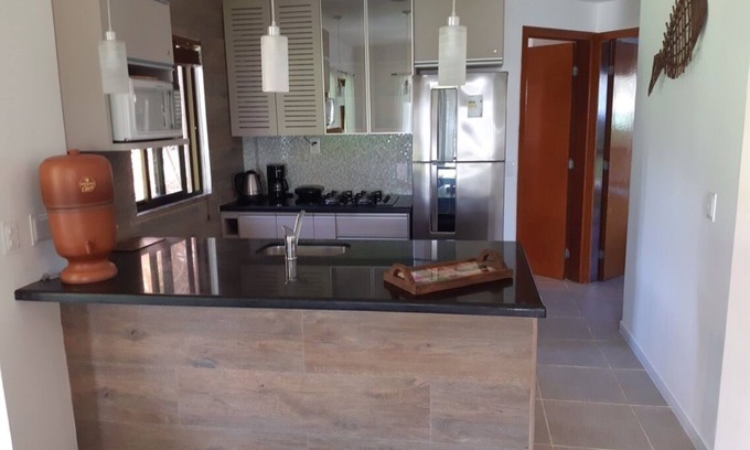 Cumbuco Condominio | Terrio / Apartamento en planta baja con acceso directo a jardín tropical