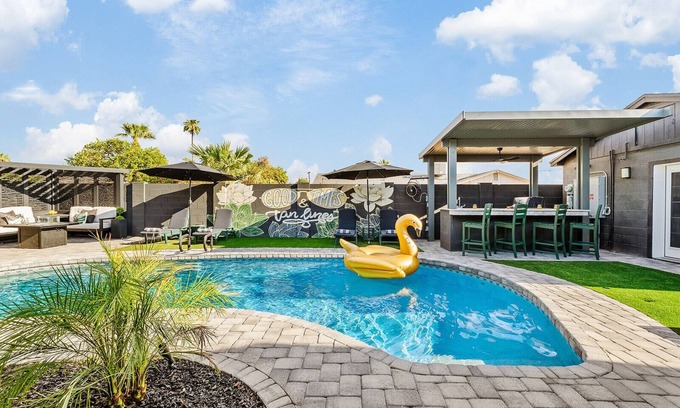 New Papago Parkway Casa | Group Fun HQ with Hot Tub + Bar, Heated Pool, Game Room & Lounge Near Old Town