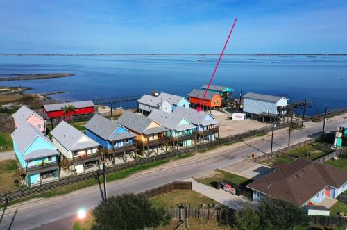 Flour Bluff Casa | Group Getaway w Pool, Boat Dock 2 Homes Laguna Village Retreat by AvantStay