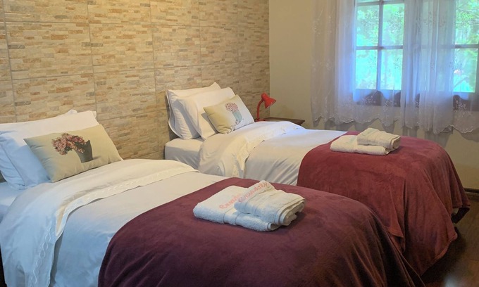 Monte Verde Cabaña | Guest house with 2 bedrooms, living room and open kitchen, with swimming pool and beautiful garden