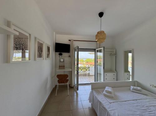 Vourvourou Apartamento | Guest Room by House Dimitra