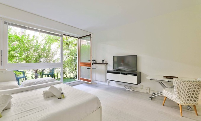 Silly-Gallieni Apartamento | GuestReady - Acogedor estudio con jardín