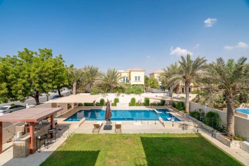 Jumeirah Park Apartamento | GuestReady - Peaceful Garden Villa l Pool & BBQ