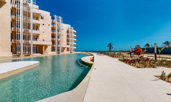 Telchac Puerto Apartamento | Gulf-view getaway with a furnished terrace, pool, & easy beach access