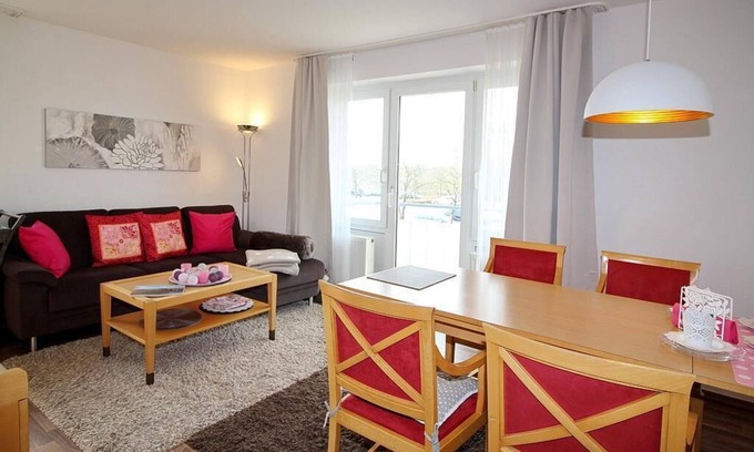 Schillig Apartamento | Hübsche Ferienwohnung am Meer mit Balkon und Blick zum Grünen Nordseedeich