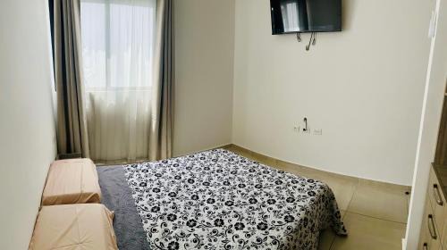 Centro Casa | Habitación con cama matrimonial