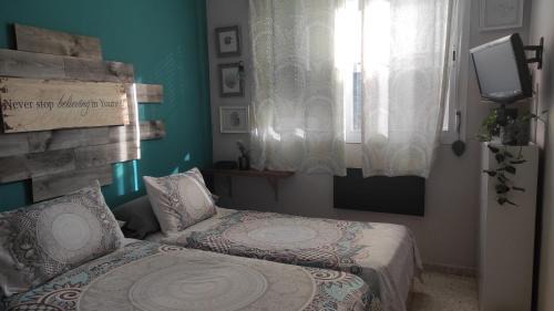 Coria del Río Casa | habitación doble a 100m paseo fluvial