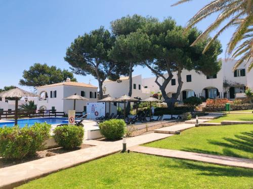 Puerto Luz Apartamento | Happy Menorca apartamento duplex ,piscina,aire acondicionado,wiffi
