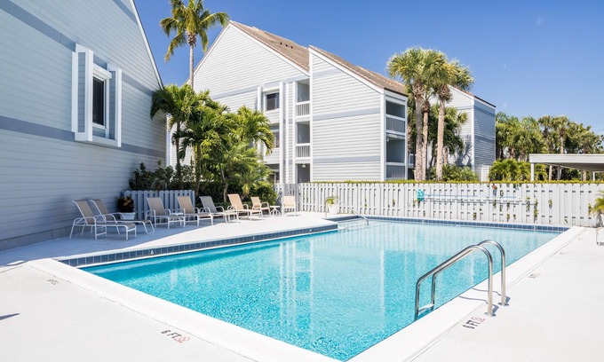 Moorings Condominio | Harbor view, sunsets and a short walk to private beach access, we have it all!