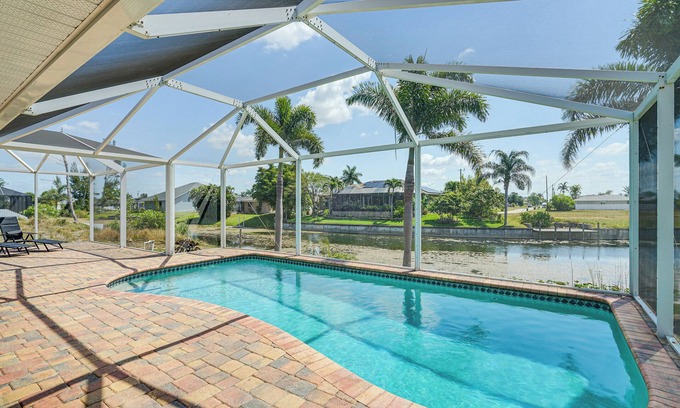Trafalgar Casa | Heated Pool & Patio: Canal-Front Cape Coral Home!