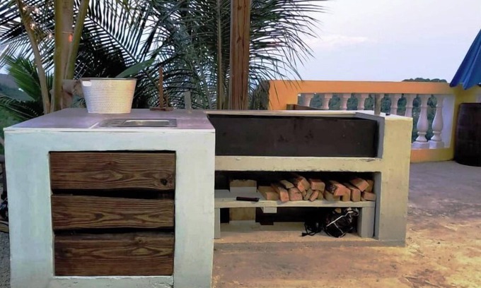 Florencio Casa | Hilltop Getaway with Ocean View, Huge Terrace & Outdoor Kitchen