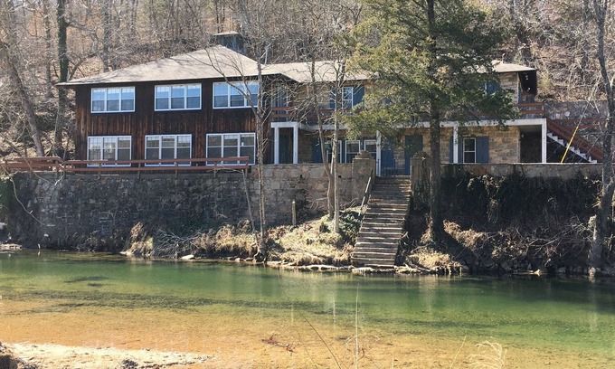 Camdenton Casa | Historic Limestone House in park setting in Ozarks