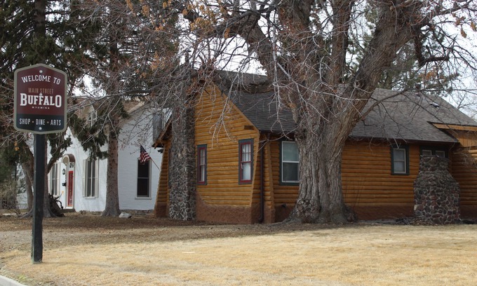 Buffalo Casa | Historic Log Cabin home on Main Street